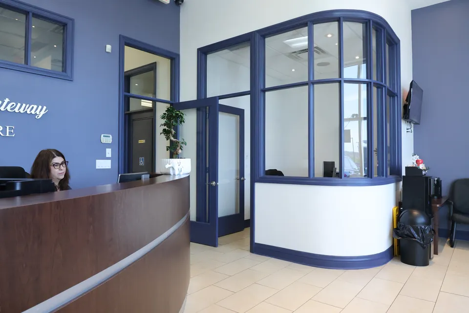The reception area with the Aurora Gateway Dental Care sign