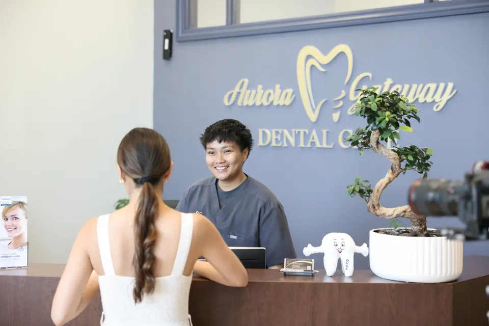 A new patient is welcomed at reception